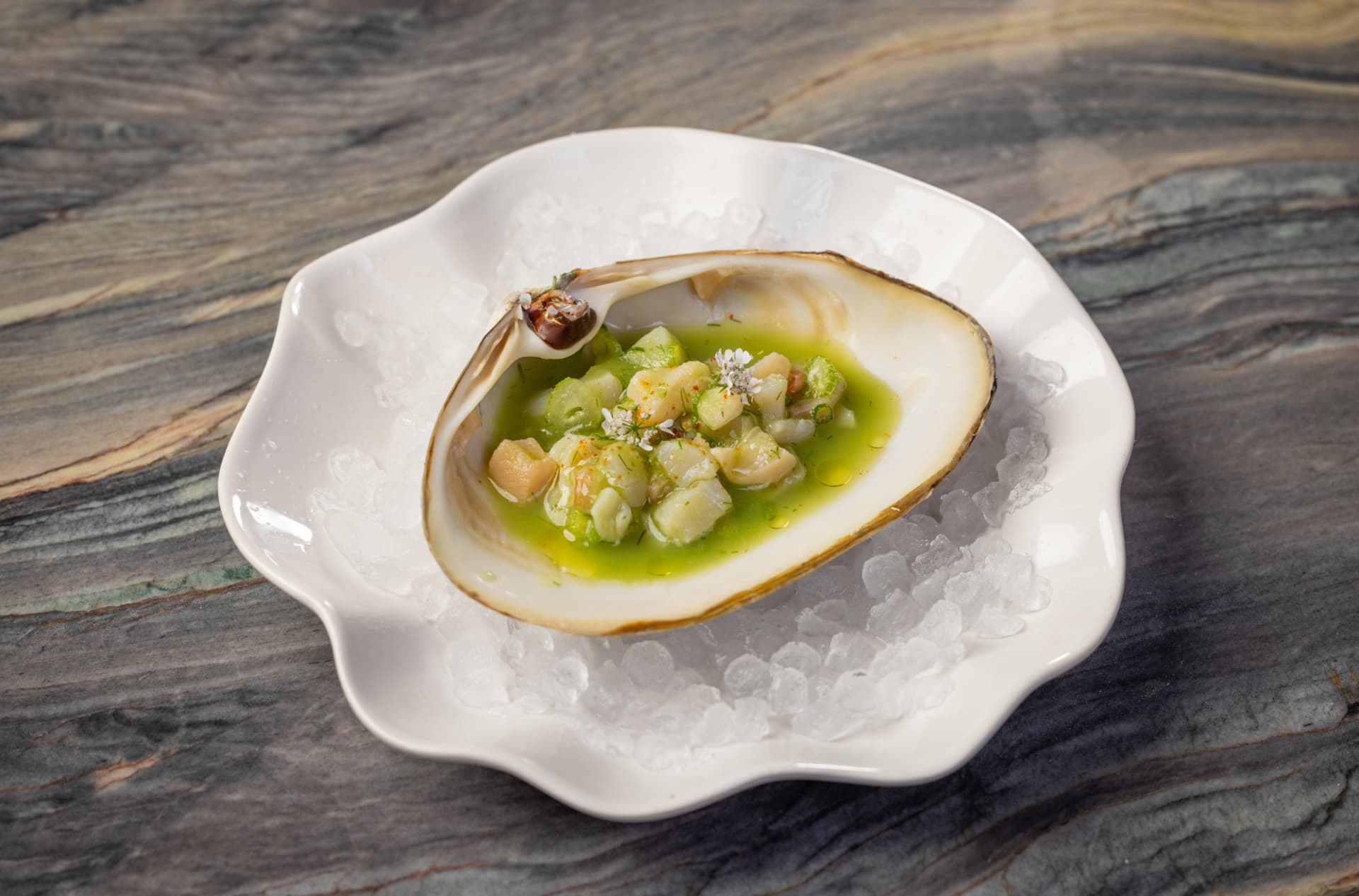 Scallop aguachile in the shell